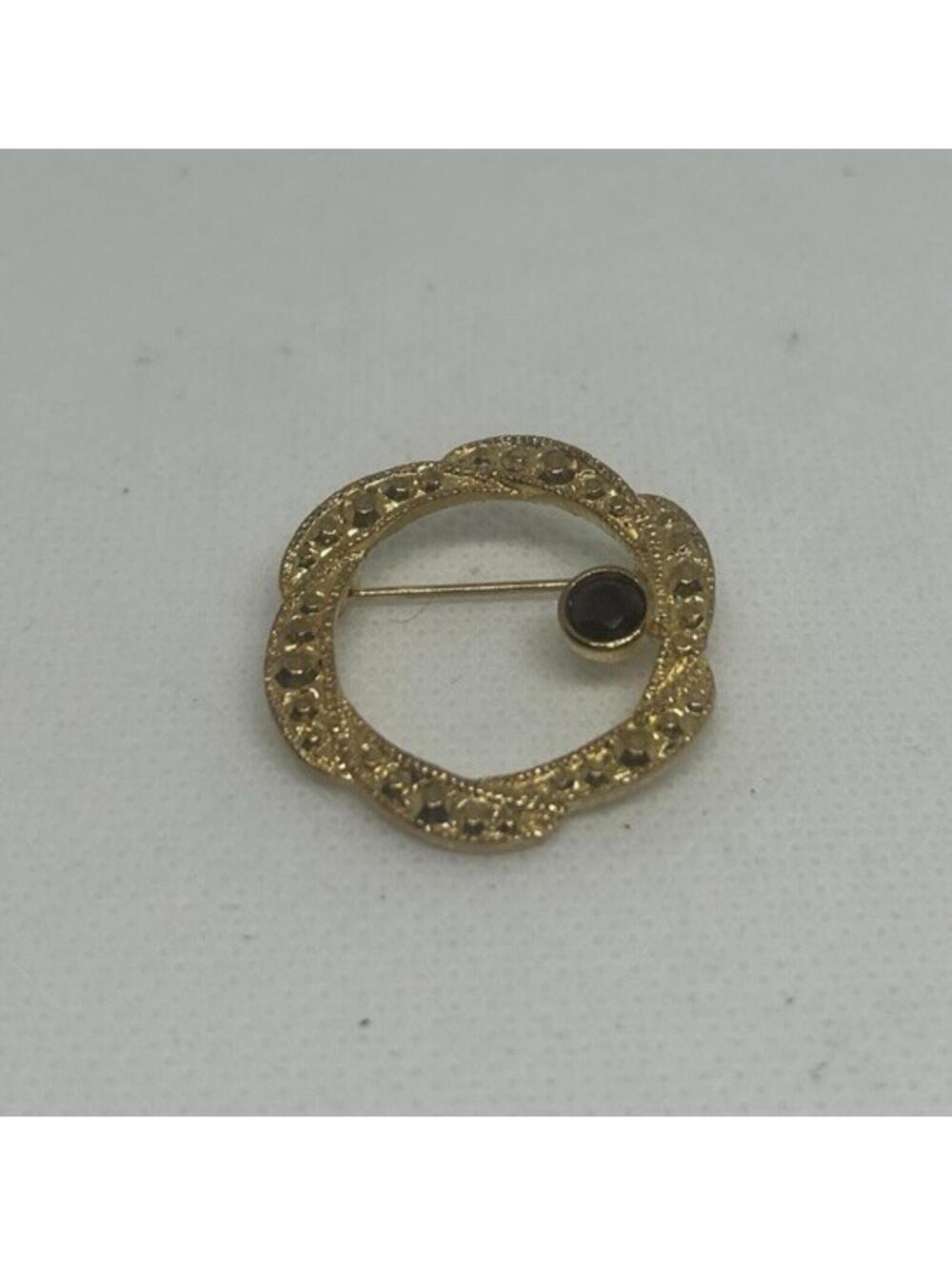 Vintage Gold Tone Circular Brooch with Dark Stone Accent